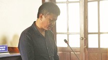 Trần Phúc Đức tại tòa nhận bản án cho 4 tội danh (ảnh P.Hoài)