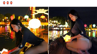 Hình ảnh được đăng trên trang Facebook cá nhân ngày 4/4, về một cô gái mặc áo hở hang trên chiếc thuyền giữa dòng sông Hoài ở phố cổ Hội An thả hoa đăng. Ảnh: Facebook nhân vật