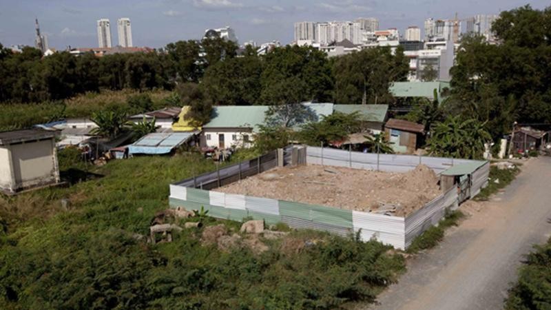 Đất của dự án bị một số người dân lấn chiếm quây hàng rào và xây phòng trọ.