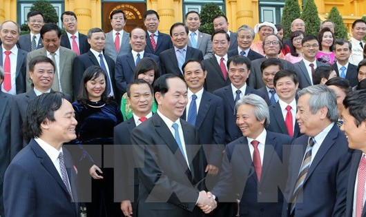 Chủ tịch nước Trần Đại Quang với các đại biểu tại buổi gặp mặt. (Ảnh: Nhan Sáng/TTXVN)