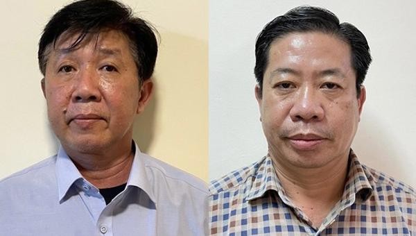 Bị can Nguyễn Thanh Trúc (bên phải) và bị can Trần Xuân Lâm (bên trái).
