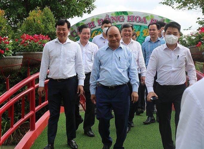  Chủ tịch nước Nguyễn Xuân Phúc khuyết khích người nông dân tham gia Hội quán để cùng nhau phát triển du lịch ảnh 1