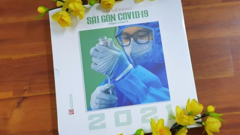 Bìa sách ảnh "Sài Gòn COVID-19" vừa được phát hành.