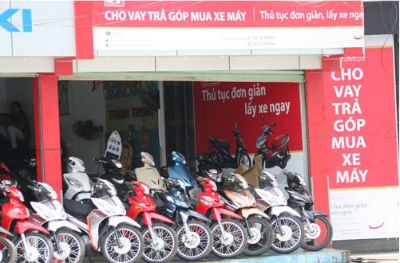“Cho vay trả góp” đang trở thành một “chiêu” kích cầu tiêu dùng trong bối cảnh kinh tế khó khăn. (Ảnh minh họa)